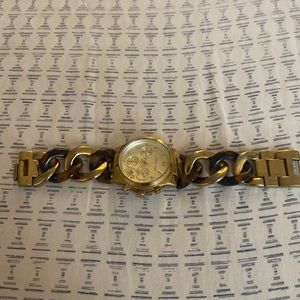 Its a brown gold watch